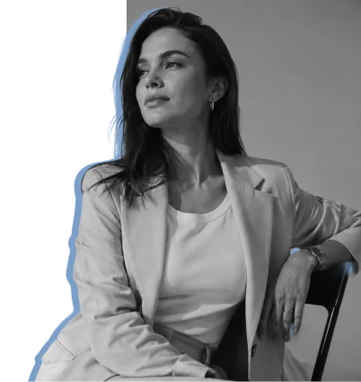 A consultant in a light suit sitting for a portrait, traced by a hand-drawn blue outline